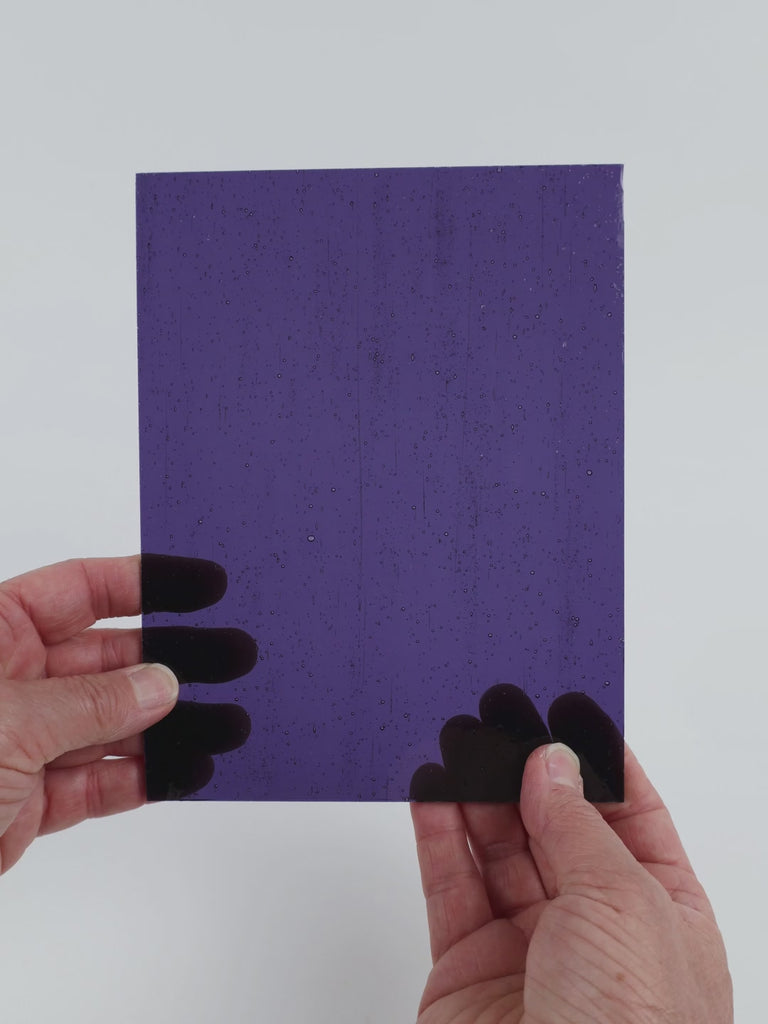 Video of the Grape glass plate in transparent purple, 15x19cm, held up and tilted to show its pattern and transparency