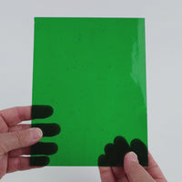 Video of the Emerald Green glass plate in transparent green, 15x19cm, held up and tilted to show its pattern and transparency