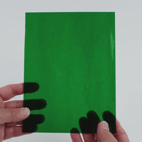 Video of the Deep Emerald glass plate in transparent green, 15x19cm, held up and tilted to show its pattern and transparency